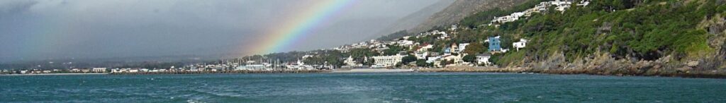 Bikini Beach and Gordon’s Bay harbour on False Bay