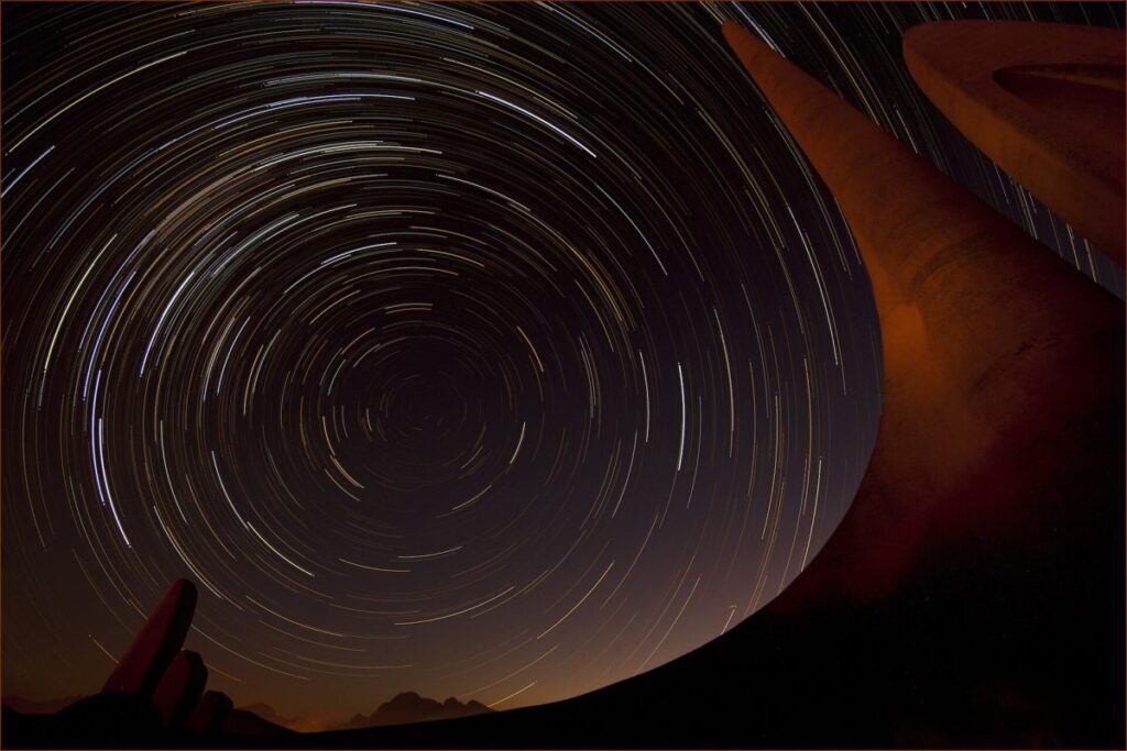 Afrikaanse Taalmonument illuminated against a night sky